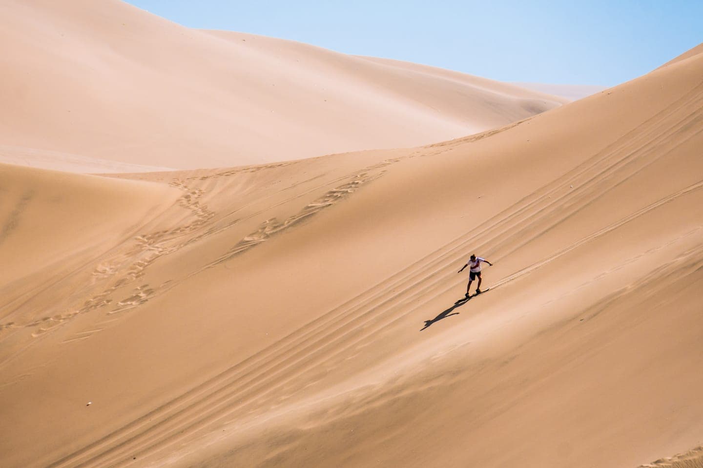 Sandboarding or sand skiing thumbnail